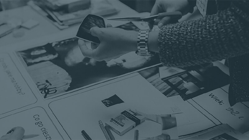 Person cutting out badges